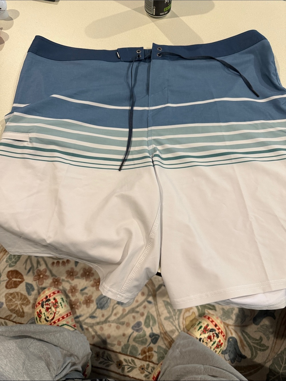 O'Neill Blue, Teal and White Striped Board Shorts
Size 40